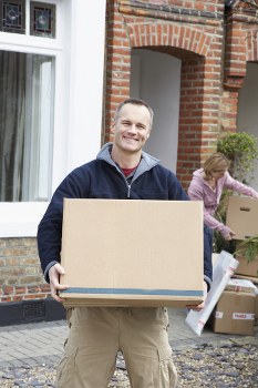 Office relocation planning in Belsize Park with packed boxes and moving equipment