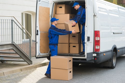 Packing boxes and wrapped household items for a move in Belsize Park