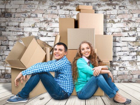 Boxes and furniture delivered into a new home in Belsize Park