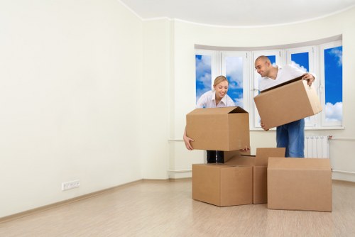 Packed boxes and furniture ready for a residential move in Belsize Park