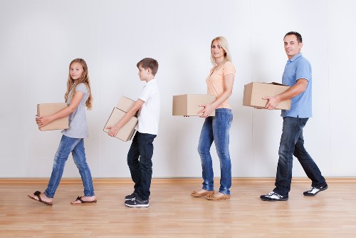 Local office moving team handling desks and office furniture in North West London